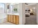 Bathroom featuring a double vanity, soaking tub, and access to the bedroom at 35402 N 32Nd Dr, Phoenix, AZ 85086