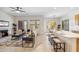 Bright and spacious living area featuring a breakfast bar and an open floor plan at 35402 N 32Nd Dr, Phoenix, AZ 85086