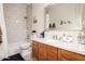 Updated bathroom with white tiled shower and granite counters, offering a clean, modern feel at 3830 E Lakewood E Pkwy # 3014, Phoenix, AZ 85048