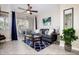 Cozy living room featuring a ceiling fan, modern decor, and sliding doors leading to the patio at 3830 E Lakewood E Pkwy # 3014, Phoenix, AZ 85048
