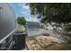 A backyard features a storage shed, patio, and trees at 4065 E University Dr # 436, Mesa, AZ 85205