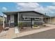 Charming gray home with landscaped front yard and covered porch at 4065 E University Dr # 436, Mesa, AZ 85205