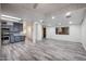 Spacious living room with ample natural light, neutral walls, and wood-look flooring at 4065 E University Dr # 436, Mesa, AZ 85205