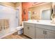 Bathroom featuring a walk-in shower, vanity with ample storage, and a neutral color palette at 41793 W Canasta Ln, Maricopa, AZ 85138