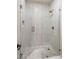 Modern bathroom featuring an open shower with geometric tile and glass surround at 4350 S White Dr, Chandler, AZ 85249
