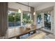 Dining area with large windows overlooking the pool, creating a serene and inviting space for meals at 4350 S White Dr, Chandler, AZ 85249