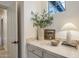 Hallway nook with decorative plant and small painting, providing a touch of nature and charm at 4350 S White Dr, Chandler, AZ 85249