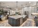 Spacious kitchen island with a farmhouse sink, stainless steel appliances, and ample cabinet space for all your needs at 4350 S White Dr, Chandler, AZ 85249