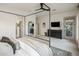 Luxurious main bedroom suite features a canopy bed and a view of the ensuite bathroom at 4350 S White Dr, Chandler, AZ 85249