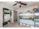This room has a bunkbed with storage and closet with built-in shelving at 5350 S River Dr, Tempe, AZ 85283