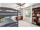 bedroom offers a bunkbed, closet, bookshelf and lots of sunlight at 5350 S River Dr, Tempe, AZ 85283