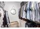 Walk-in closet features ample hanging space and storage for your wardrobe at 5350 S River Dr, Tempe, AZ 85283