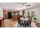 Bright dining area featuring an elegant round table, and doors to the outdoor patio at 5350 S River Dr, Tempe, AZ 85283