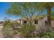 A charming single-story home boasting a well-kept yard with mature landscaping and a neutral color palette at 5350 S River Dr, Tempe, AZ 85283