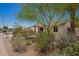A charming single-story home boasting a well-kept yard with mature landscaping and a neutral color palette at 5350 S River Dr, Tempe, AZ 85283