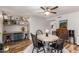 Cozy living area featuring a dining area, a built in desk, and a water dispenser at 5350 S River Dr, Tempe, AZ 85283