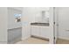 Bathroom featuring a double sink vanity with granite counters and a large mirror at 653 W Freedom St, Florence, AZ 85132