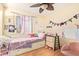 Cozy bedroom featuring carpet, closet and natural light at 7259 E Glencove St, Mesa, AZ 85207