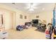 Bright living room featuring tile floors, neutral paint, and ample space for entertaining or relaxing at 7259 E Glencove St, Mesa, AZ 85207