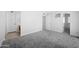 The carpeted bedroom has neutral tones and is conveniently located near the bathroom and closet at 8314 N 21St Dr # K208, Phoenix, AZ 85021
