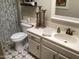 Charming bathroom features a classic vanity with modern sink and a shower-tub combination with stylish tiles at 1036 E Wagon Wheel Dr, Phoenix, AZ 85020