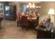 Elegant dining room with a chandelier, round table, and seating for six, great for entertaining at 1036 E Wagon Wheel Dr, Phoenix, AZ 85020