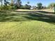 Wide, lush green grass field with street views in the background at 1036 E Wagon Wheel Dr, Phoenix, AZ 85020