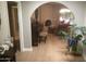 Spacious living room featuring hardwood floors, a fireplace, and plenty of natural light at 1036 E Wagon Wheel Dr, Phoenix, AZ 85020