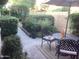 Charming patio with garden area, perfect for outdoor dining and relaxation in a tranquil setting at 1036 E Wagon Wheel Dr, Phoenix, AZ 85020