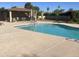 Beautiful community pool with mature landscaping and plenty of lounge chairs at 1036 E Wagon Wheel Dr, Phoenix, AZ 85020