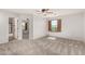 Spacious bedroom with neutral walls, ceiling fan, carpeted floor, and a window with shutters at 10830 W El Cortez Pl, Peoria, AZ 85383