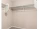 A closet includes shelving, clothing rods, and carpeted floors at 10830 W El Cortez Pl, Peoria, AZ 85383