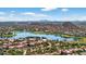 Picturesque lake community surrounded by beautiful mountain views and rugged desert landscapes at 10897 S Turtle Dove S Dr, Goodyear, AZ 85338