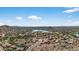 Primary-planned community featuring picturesque views of a lake surrounded by scenic mountain landscapes at 10897 S Turtle Dove S Dr, Goodyear, AZ 85338