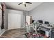 Office featuring a desk, rolling chair, and closet at 10897 S Turtle Dove S Dr, Goodyear, AZ 85338