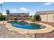 Sparkling pool with a perfectly manicured deck offers the ultimate in relaxation at 10897 S Turtle Dove S Dr, Goodyear, AZ 85338