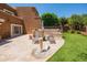 Large backyard featuring travertine patio, artificial lawn, water feature and outdoor furniture at 11025 N 10Th St, Phoenix, AZ 85020