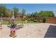 Paver patio and artificial lawn backyard with landscaping, seating, and desert views at 11025 N 10Th St, Phoenix, AZ 85020