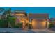 Charming two-story home with attached two car garage, desert landscaping and a cozy balcony at 11025 N 10Th St, Phoenix, AZ 85020