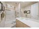 Well-lit bathroom with a shower-tub combo, ample counter space and cabinet storage at 11081 E Betony Dr, Scottsdale, AZ 85255