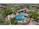 Wonderful community pool with comfortable seating area and mountain views at 11081 E Betony Dr, Scottsdale, AZ 85255