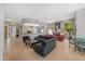 Open floor plan showcases a living room with fireplace and views into a kitchen area and dining space at 11081 E Betony Dr, Scottsdale, AZ 85255