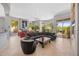 Spacious living room with a fireplace, comfortable seating, and large windows offering great views at 11081 E Betony Dr, Scottsdale, AZ 85255