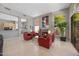 Relaxing living area with fireplace and large windows offering bright, natural light and views of the property at 11081 E Betony Dr, Scottsdale, AZ 85255