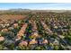 Expansive residential neighborhood features mature trees, single Gathering homes, and solar panels at 11866 N 143Rd Ave, Surprise, AZ 85379