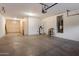 Spacious garage with plenty of storage and a water heater at 11866 N 143Rd Ave, Surprise, AZ 85379