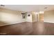 Large living room with hardwood flooring and lots of natural light at 11866 N 143Rd Ave, Surprise, AZ 85379