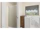 Bathroom featuring walk-in shower and walk-in tub at 1338 E Greenway Cir, Mesa, AZ 85203