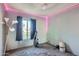Spare bedroom with neutral walls, a large window, and a carpet floor at 13802 N 37Th Dr, Phoenix, AZ 85053