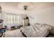 Bright primary bedroom with carpet floors and lots of natural light at 13802 N 37Th Dr, Phoenix, AZ 85053